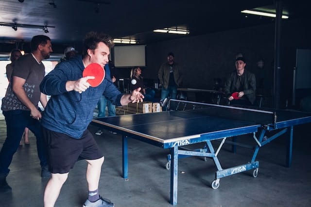 Ping pong serving rules behind the end line